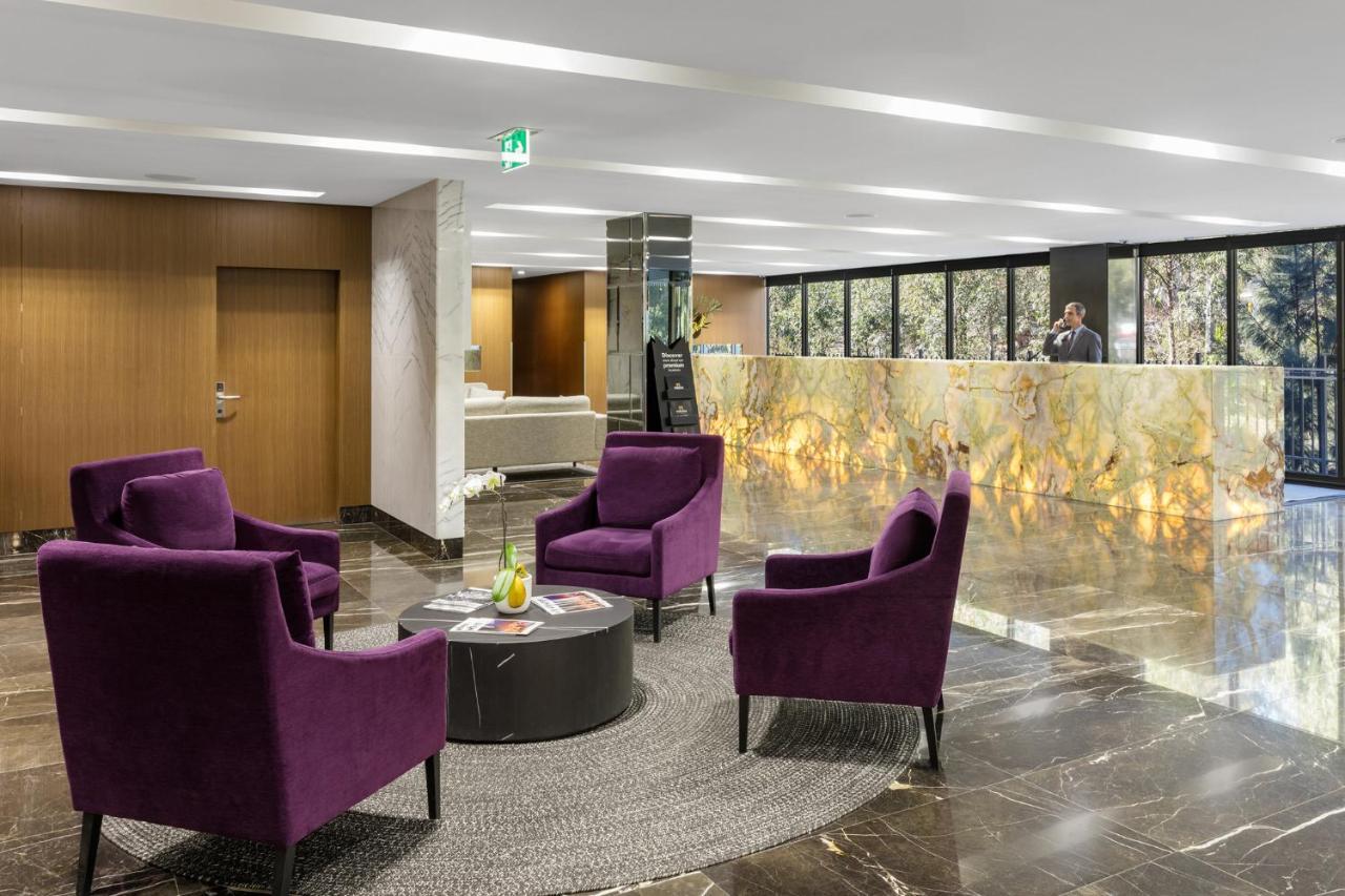 Meriton Suites North Ryde Sidney Exterior foto Lobby